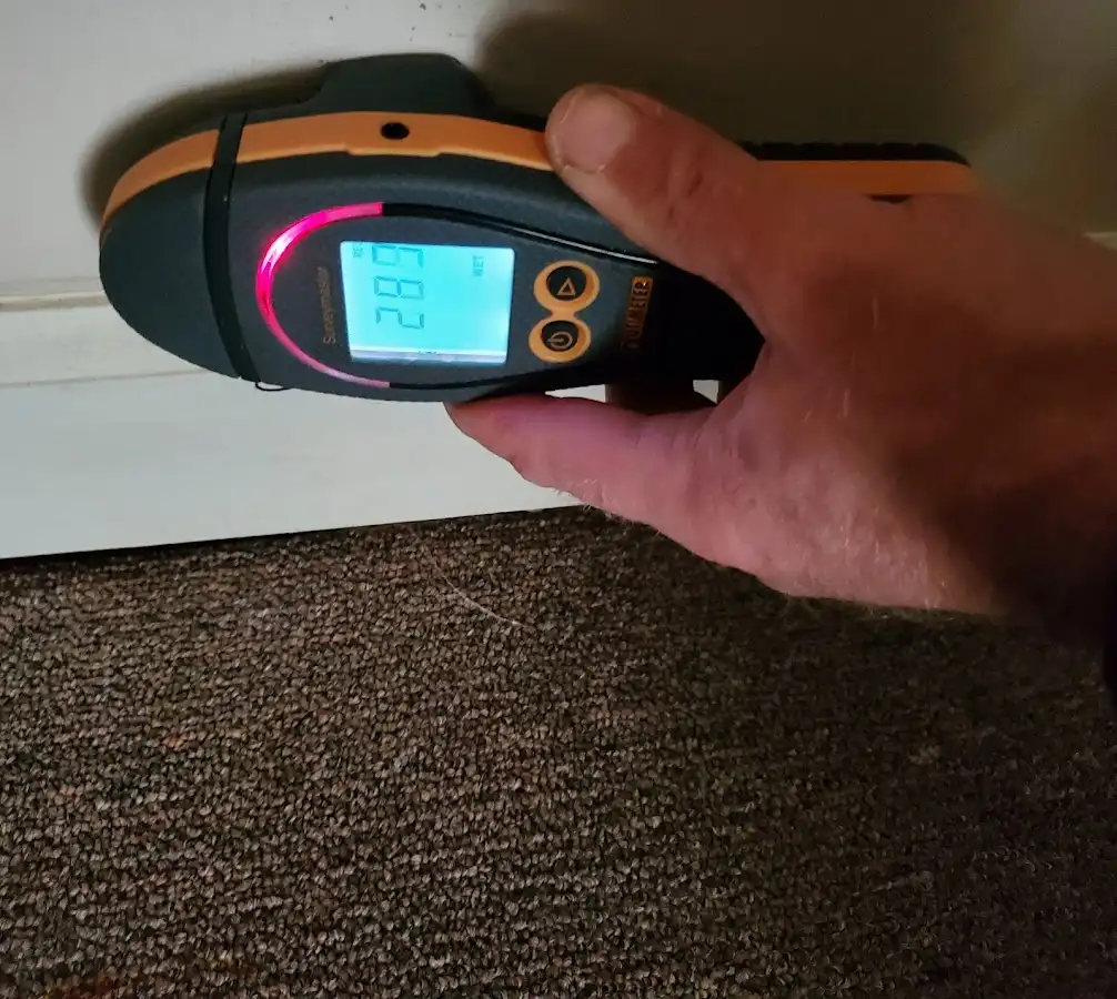 Moisture detection at baseboard during Burst Pipe Cleanup in Redwood City